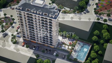 Стартовые цены на квартиры от 70 до 140 кв.м. в Махмутларе, Алания - Ракурс 1