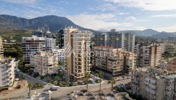 Стартовые цены на квартиры от 70 до 140 кв.м. в Махмутларе, Алания - Ракурс 12