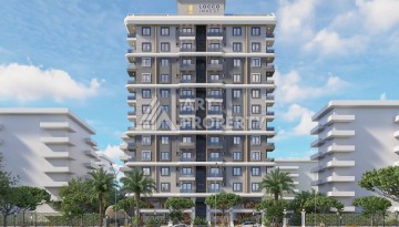 Квартиры с видом на море 2+1, 3+1 и 4+2. Первая береговая линия в Махмутларе - Ракурс 20