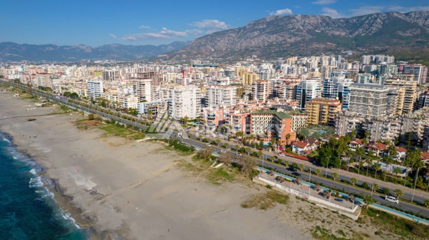 Квартиры с видом на море 2+1, 3+1 и 4+2. Первая береговая линия в Махмутларе - Ракурс 31