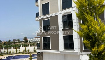 Квартира 2+1 в Махмутларе по выгодной цене, 70 кв.м. - Ракурс 1