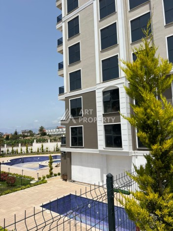 Квартира 2+1 в Махмутларе по выгодной цене, 70 кв.м. - Ракурс 0