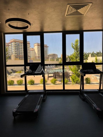 Квартира 2+1 в Махмутларе по выгодной цене, 70 кв.м. - Ракурс 4