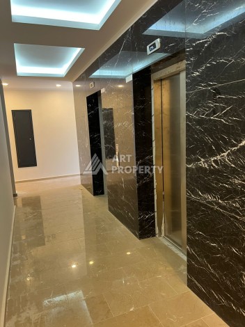 Квартира 2+1 в Махмутларе по выгодной цене, 70 кв.м. - Ракурс 5