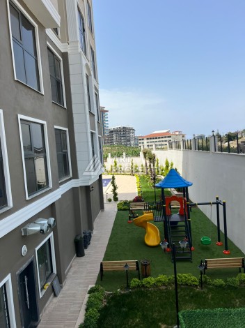 Квартира 2+1 в Махмутларе по выгодной цене, 70 кв.м. - Ракурс 7