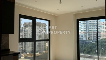 Квартира 2+1 в Махмутларе по выгодной цене, 70 кв.м. - Ракурс 11