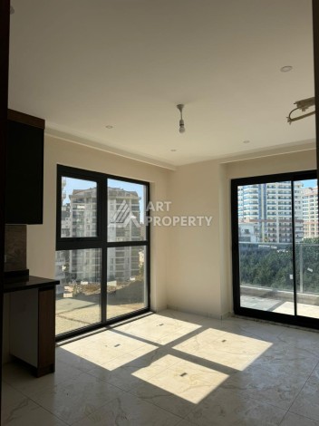 Квартира 2+1 в Махмутларе по выгодной цене, 70 кв.м. - Ракурс 10