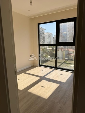 Квартира 2+1 в Махмутларе по выгодной цене, 70 кв.м. - Ракурс 14