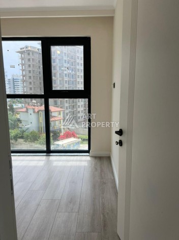 Квартира 2+1 в Махмутларе по выгодной цене, 70 кв.м. - Ракурс 16