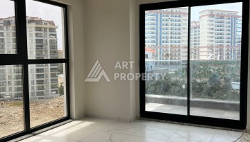 Квартира 2+1 в Махмутларе по выгодной цене, 70 кв.м. - Ракурс 18