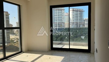 Квартира 2+1 в Махмутларе по выгодной цене, 70 кв.м. - Ракурс 21