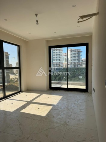 Квартира 2+1 в Махмутларе по выгодной цене, 70 кв.м. - Ракурс 20