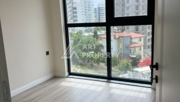 Квартира 2+1 в Махмутларе по выгодной цене, 70 кв.м. - Ракурс 24