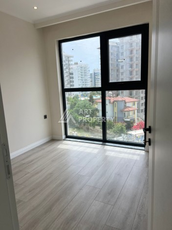 Квартира 2+1 в Махмутларе по выгодной цене, 70 кв.м. - Ракурс 23