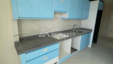 Квартира 2+1 с видом на море в Махмутларе, 90 кв.м. - Ракурс 6