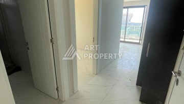 Квартира 2+1 с видом на море в Махмутларе, 90 кв.м. - Ракурс 7