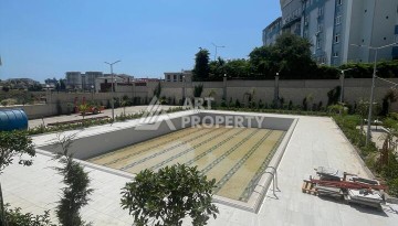 Квартира 2+1 с видом на море в Махмутларе, 90 кв.м. - Ракурс 8