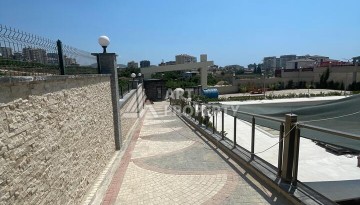 Квартира 2+1 с видом на море в Махмутларе, 90 кв.м. - Ракурс 9