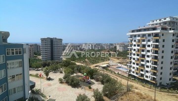 Квартира 2+1 с видом на море в Махмутларе, 90 кв.м. - Ракурс 10