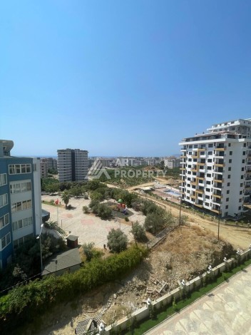 Квартира 2+1 с видом на море в Махмутларе, 90 кв.м. - Ракурс 9