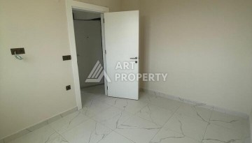 Квартира 2+1 с видом на море в Махмутларе, 90 кв.м. - Ракурс 16