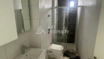 Квартира 2+1 с видом на море в Махмутларе, 90 кв.м. - Ракурс 17