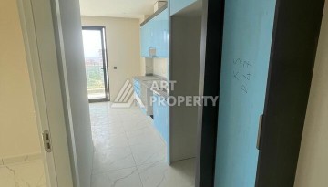 Квартира 2+1 с видом на море в Махмутларе, 90 кв.м. - Ракурс 18
