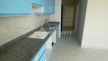 Квартира 2+1 с видом на море в Махмутларе, 90 кв.м. - Ракурс 20