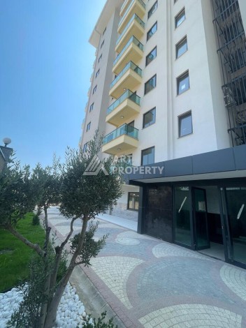 Квартира 2+1 с видом на море в Махмутларе, 90 кв.м. - Ракурс 23