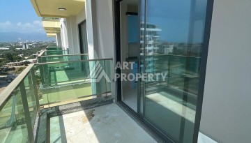 Квартира 2+1 с видом на море в Махмутларе, 90 кв.м. - Ракурс 27