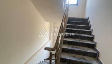 Квартира 2+1 с видом на море в Махмутларе, 90 кв.м. - Ракурс 28