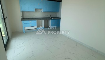 Квартира 2+1 с видом на море в Махмутларе, 90 кв.м. - Ракурс 32