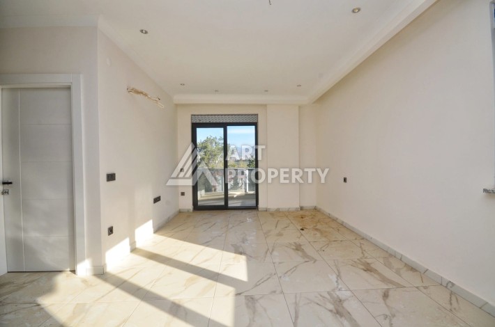 Квартира 1+1 в камерном ЖК, 55 м².   Махмутлар, Алания - Ракурс 4