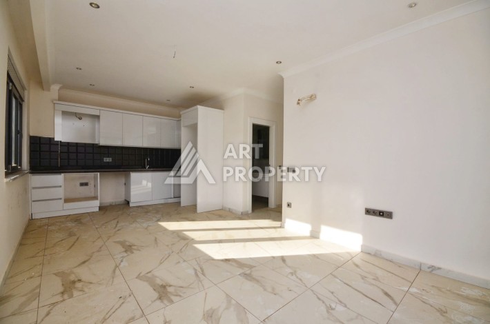 Квартира 1+1 в камерном ЖК, 55 м².   Махмутлар, Алания - Ракурс 6