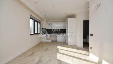 Квартира 1+1 в камерном ЖК, 55 м².   Махмутлар, Алания - Ракурс 9