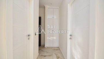 Квартира 1+1 в камерном ЖК, 55 м².   Махмутлар, Алания - Ракурс 11