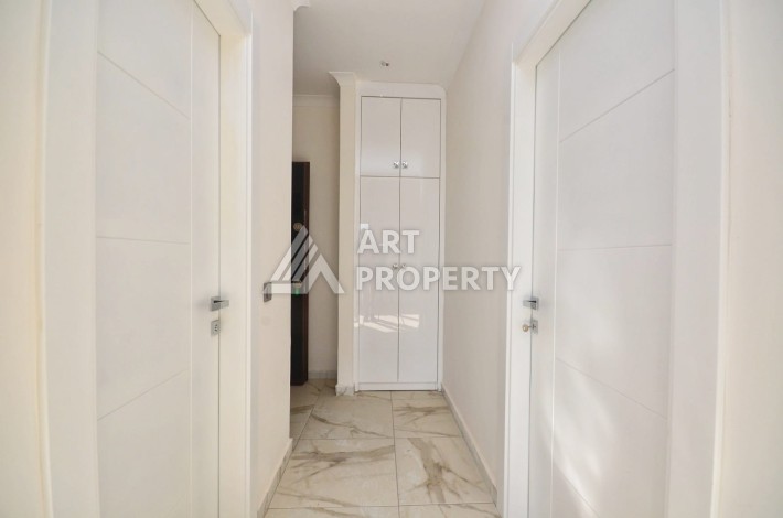 Квартира 1+1 в камерном ЖК, 55 м².   Махмутлар, Алания - Ракурс 10