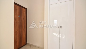Квартира 1+1 в камерном ЖК, 55 м².   Махмутлар, Алания - Ракурс 12