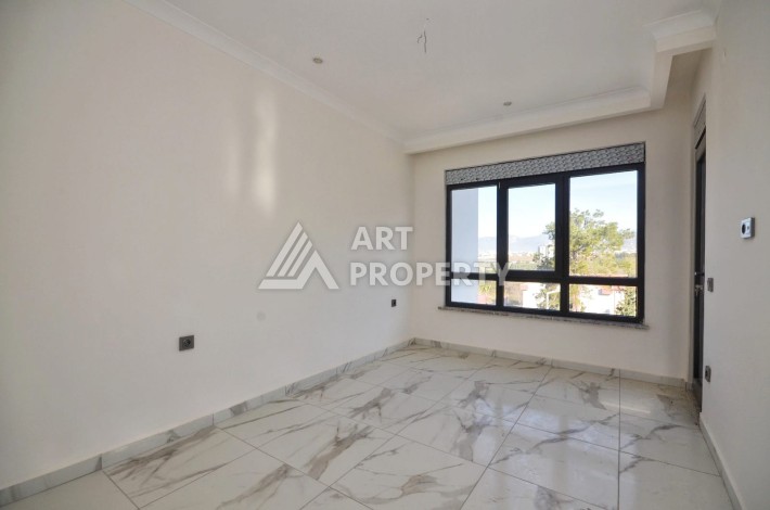 Квартира 1+1 в камерном ЖК, 55 м².   Махмутлар, Алания - Ракурс 12