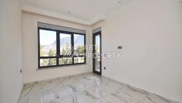 Квартира 1+1 в камерном ЖК, 55 м².   Махмутлар, Алания - Ракурс 14