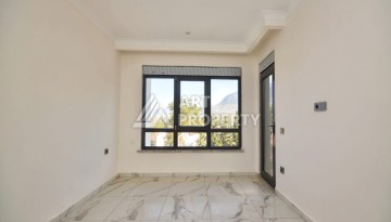 Квартира 1+1 в камерном ЖК, 55 м².   Махмутлар, Алания - Ракурс 15