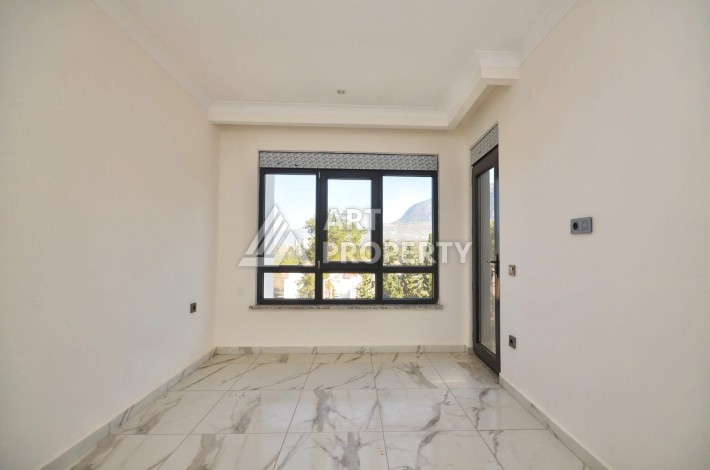 Квартира 1+1 в камерном ЖК, 55 м².   Махмутлар, Алания - Ракурс 14