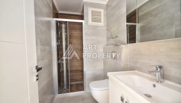 Квартира 1+1 в камерном ЖК, 55 м².   Махмутлар, Алания - Ракурс 16