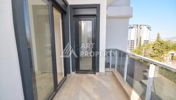 Квартира 1+1 в камерном ЖК, 55 м².   Махмутлар, Алания - Ракурс 18