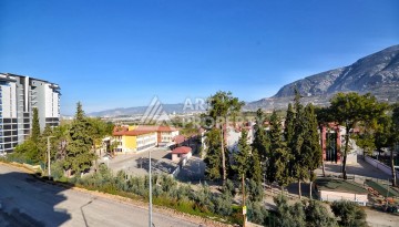 Квартира 1+1 в камерном ЖК, 55 м².   Махмутлар, Алания - Ракурс 21