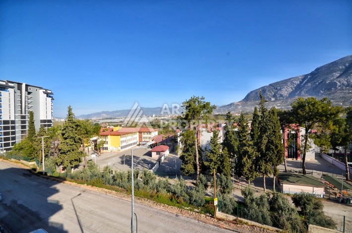 Квартира 1+1 в камерном ЖК, 55 м².   Махмутлар, Алания - Ракурс 20