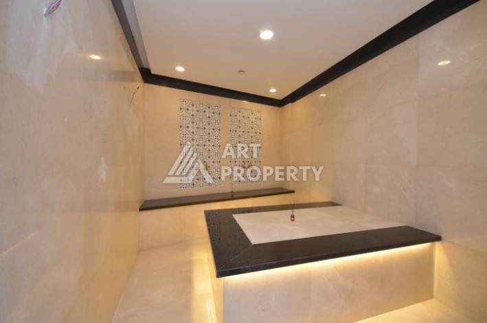 Квартира 1+1 в камерном ЖК, 55 м².   Махмутлар, Алания - Ракурс 21