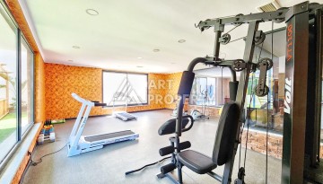 Квартира 1+1 в камерном ЖК, 55 м².   Махмутлар, Алания - Ракурс 26