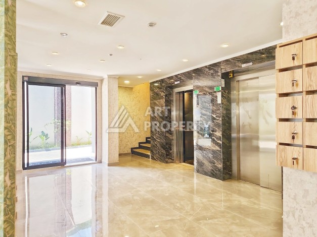 Квартира 1+1 в камерном ЖК, 55 м².   Махмутлар, Алания - Ракурс 27