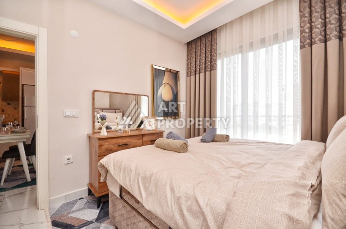 Меблированная квартира 1+1 в Махмутларе,  50 кв.м. - Ракурс 9